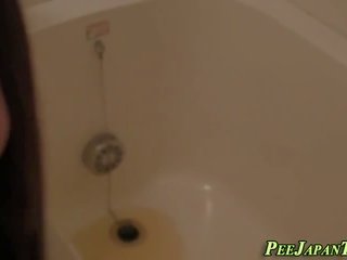 Japanese ho pees in bath