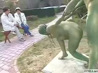 Green japonská zahrada statues souložit v veřejné