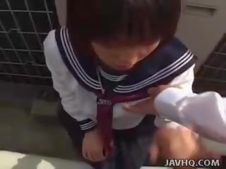 Japanese teen in a lady outdoor blowjob fun